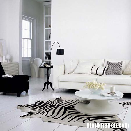 0830fcc8763553478ec6d36c6c402e4b Phòng khách thanh thoát với sofa trắng và nội thất hiện đại